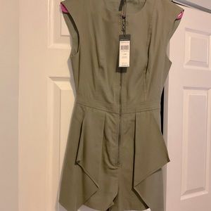 Romper new with tags BCBG. Perfect for a casual night out. Size 0 or XXS.